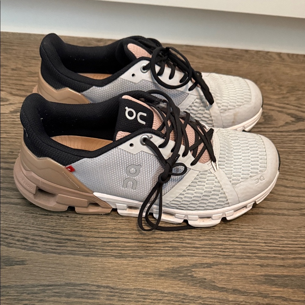 On Running Black and White Athletic Shoes